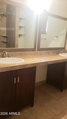 a wooden bench sitting in middle of the grass