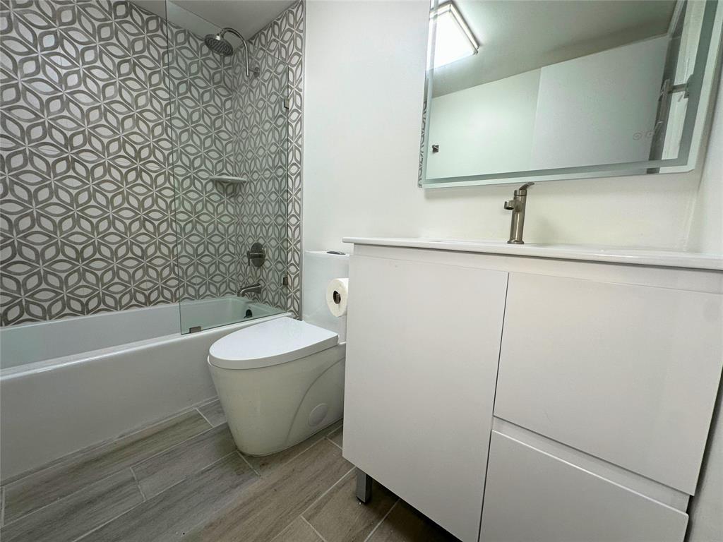 50 Southwest 3rd Avenue, Unit 110 Boca Raton, FL 33432 - Photo 11 of 21 a bathroom with a bathtub and shower