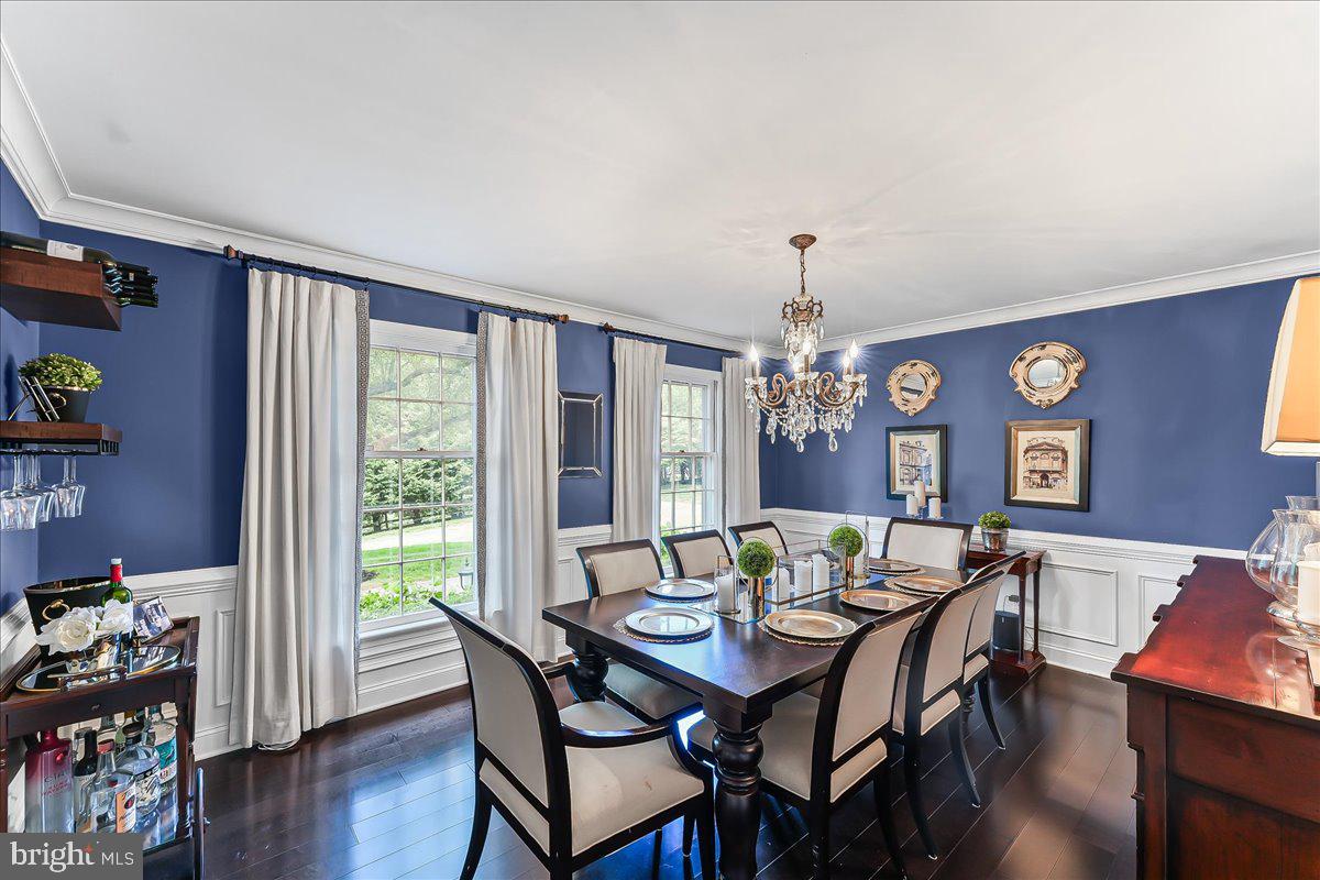 204 Country Gate Road Wayne, PA 19087 - Photo 16 of 34 a view of a dining room with furniture window and wooden floor