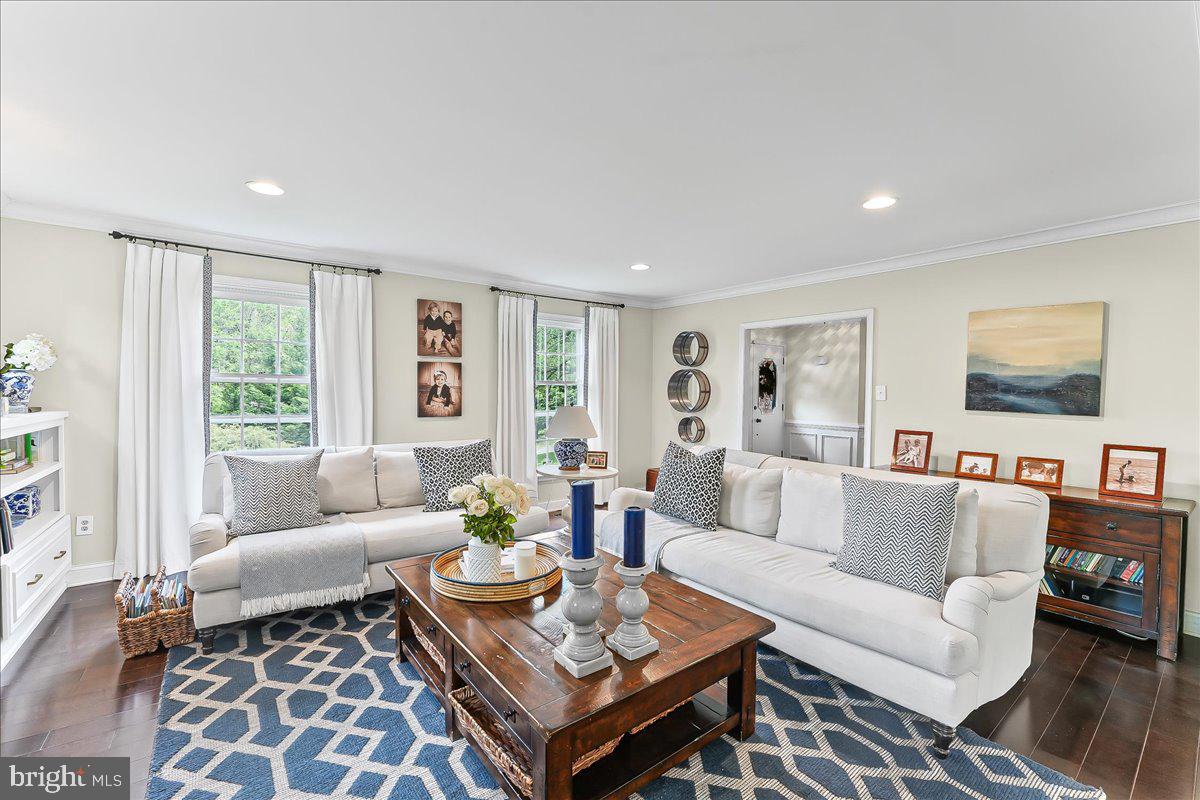 204 Country Gate Road Wayne, PA 19087 - Photo 7 of 34 a living room with furniture and a large window