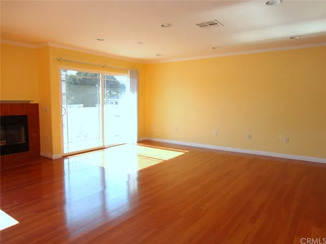 a kitchen with stainless steel appliances a stove top oven