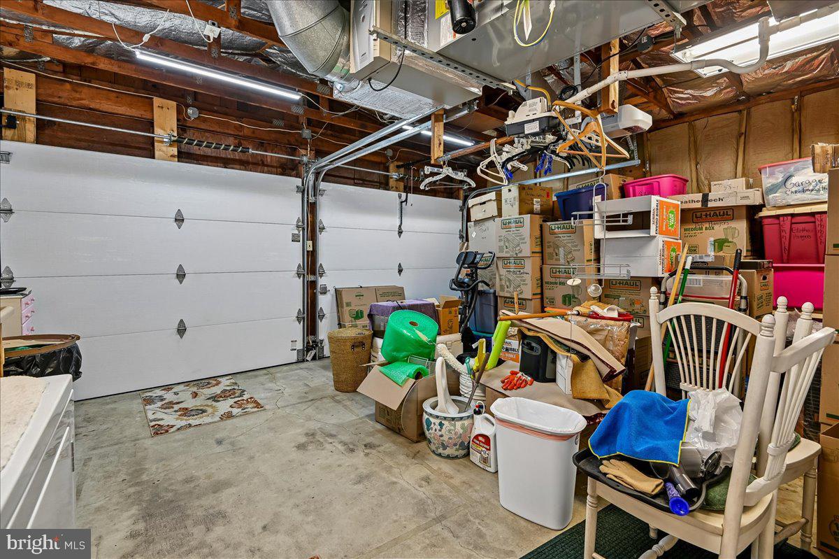 1731 Tacoma Road Edgewater, MD 21037 - Photo 42 of 59 Cluttered garage with ample storage.