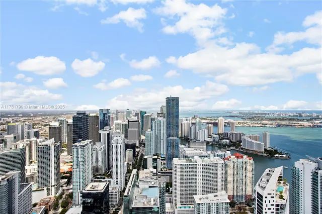 a view of a city with a lake