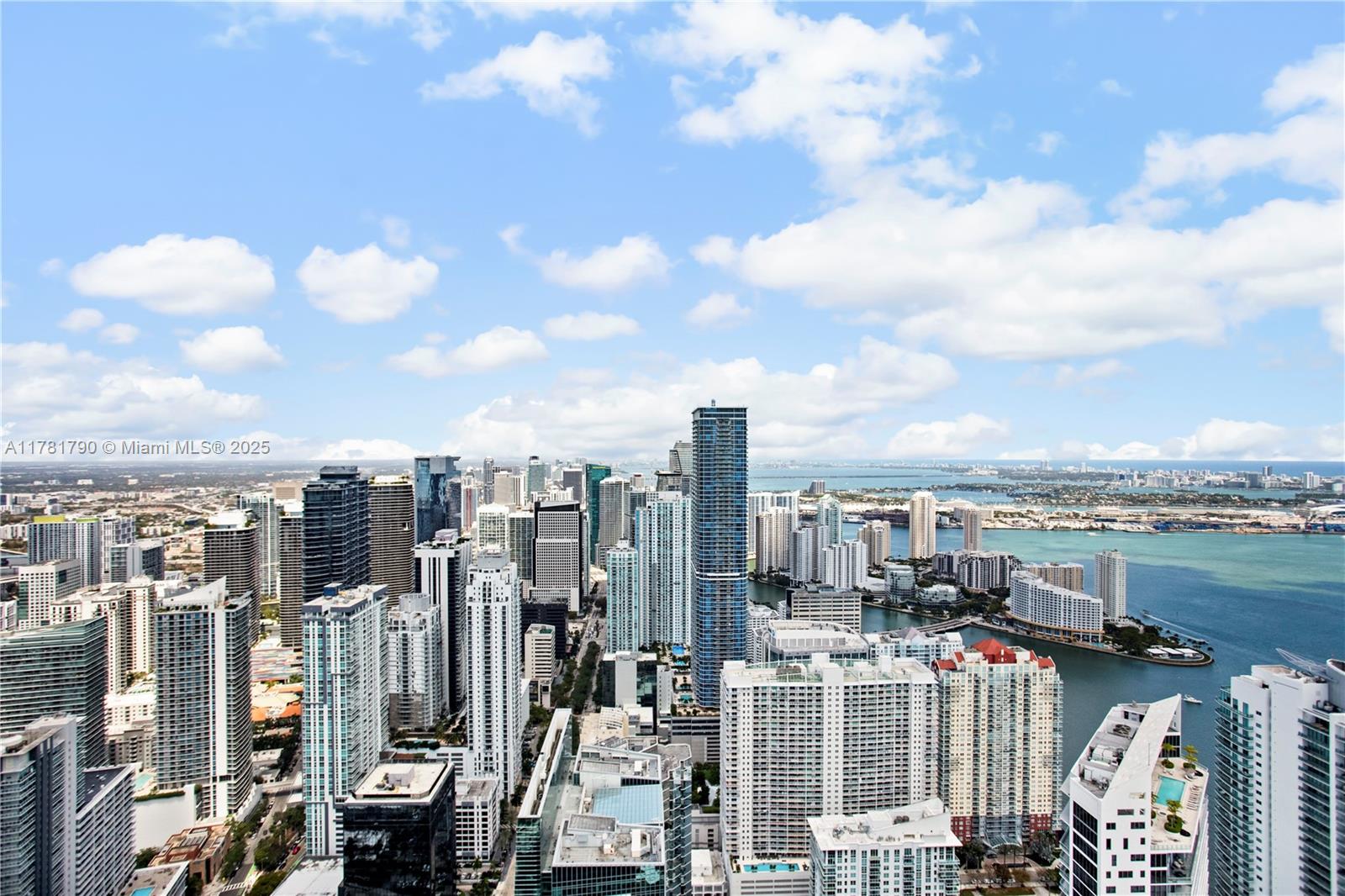 1425 Brickell Avenue, Unit PH4BCD Miami, FL 33131 - Photo 15 of 28 a view of a city with a lake