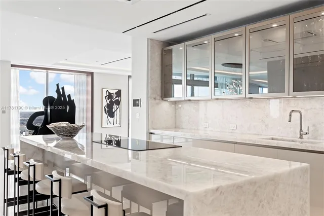 a kitchen with a sink and a cabinets