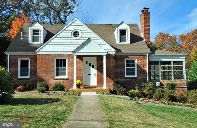 9518 St Andrews Way Silver Spring, MD 20901 - Photo 1 of 29 a front view of a house with a yard