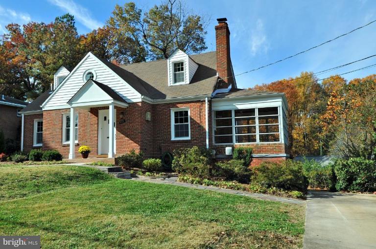 9518 St Andrews Way Silver Spring, MD 20901 - Photo 3 of 29 a front view of a house with a yard