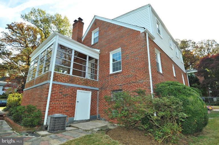 9518 St Andrews Way Silver Spring, MD 20901 - Photo 29 of 29 a front view of a house with garden