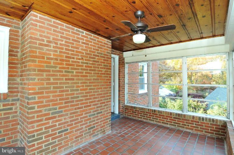 9518 St Andrews Way Silver Spring, MD 20901 - Photo 8 of 29 a view of a room with a large window
