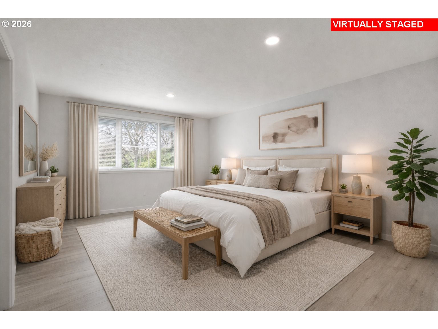 15765 Southwest Highland Court Portland, OR 97224 - Photo 14 of 30 a spacious bedroom with a bed a couch and potted plant