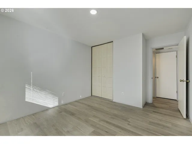 a bathroom with a sink toilet a mirror and vanity