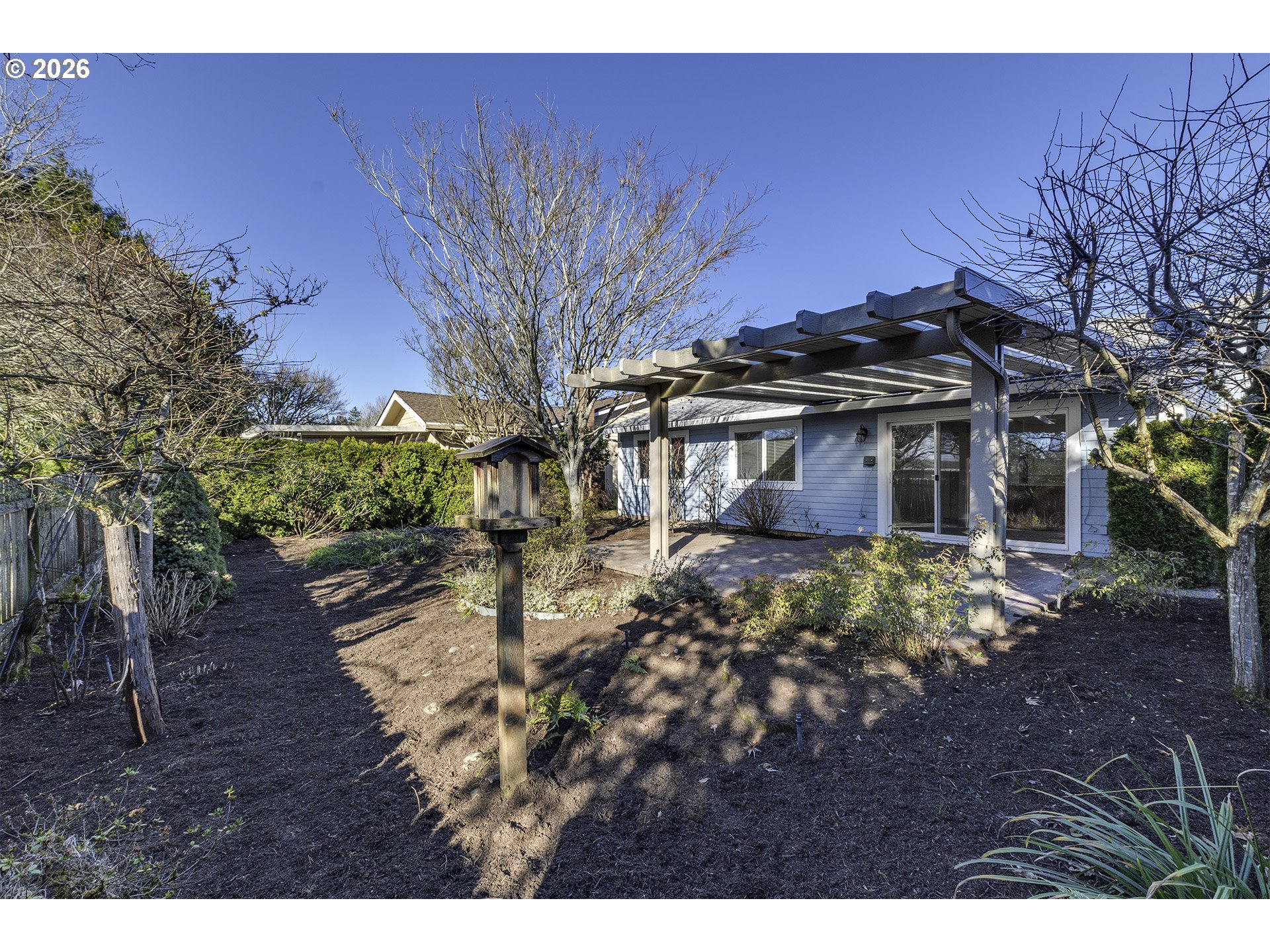15765 Southwest Highland Court Portland, OR 97224 - Photo 22 of 30 a view of a house with a yard
