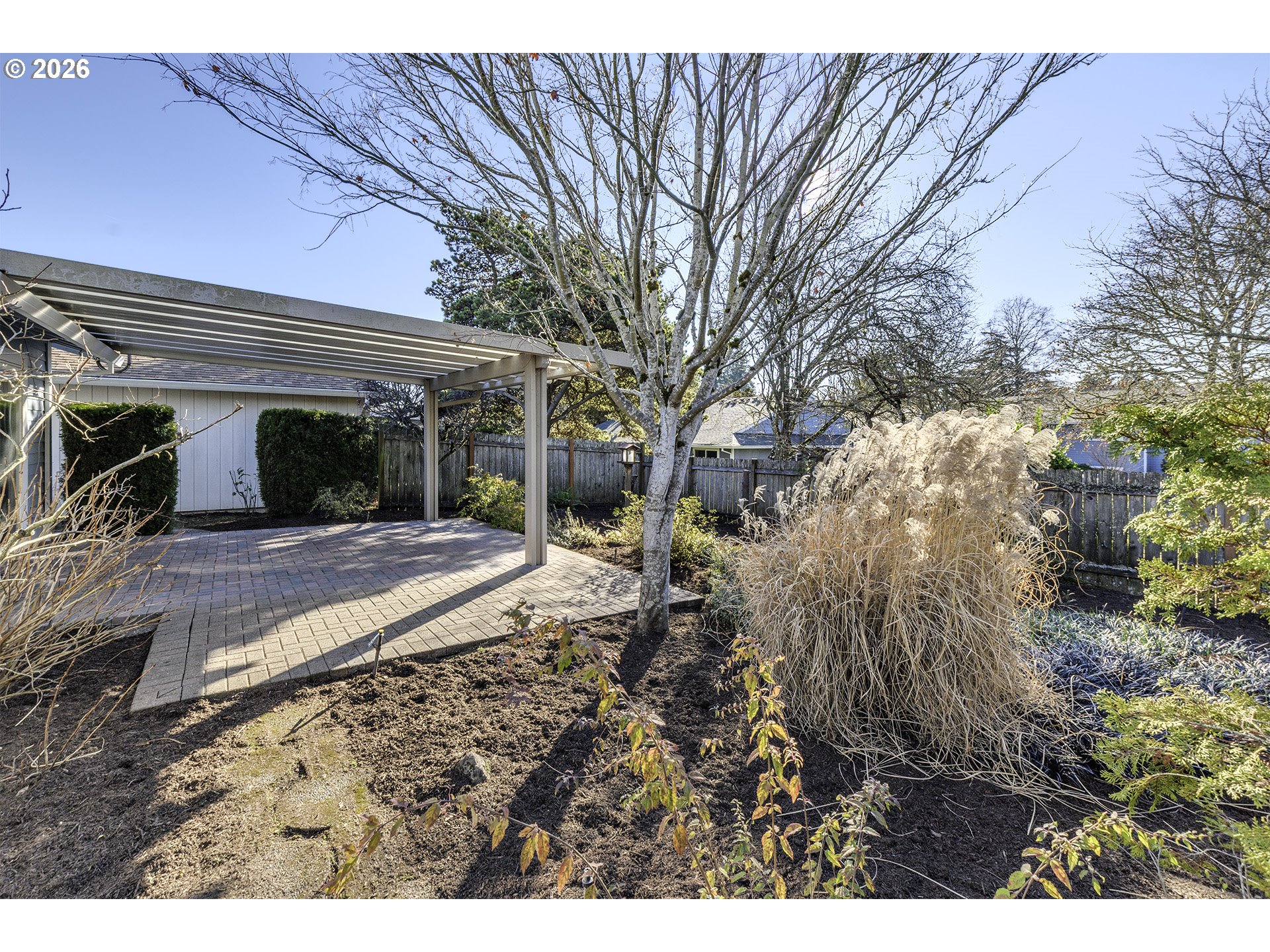 15765 Southwest Highland Court Portland, OR 97224 - Photo 25 of 30 a view of a backyard with large trees