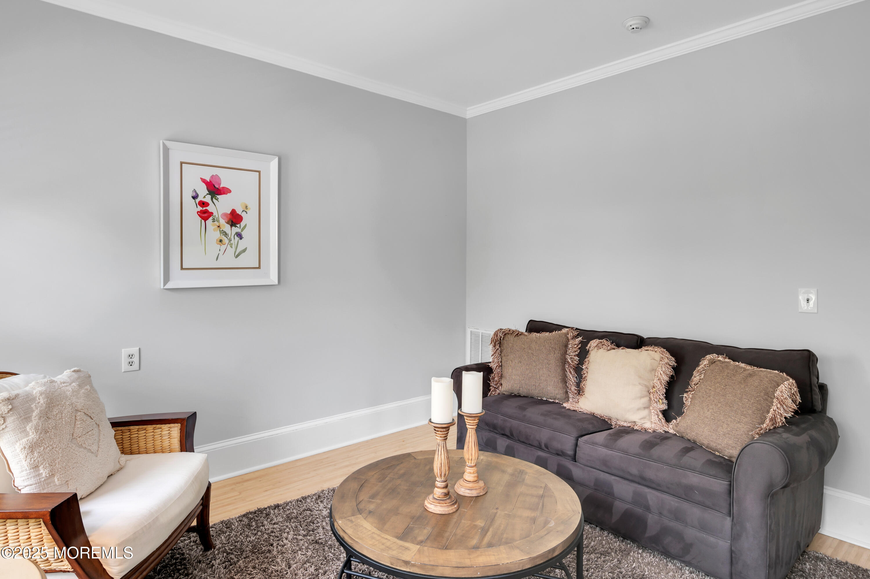 512 Main Avenue, Unit 4 Point Pleasant Beach, NJ 08742 - Photo 22 of 38 a living room with furniture and a wooden floor