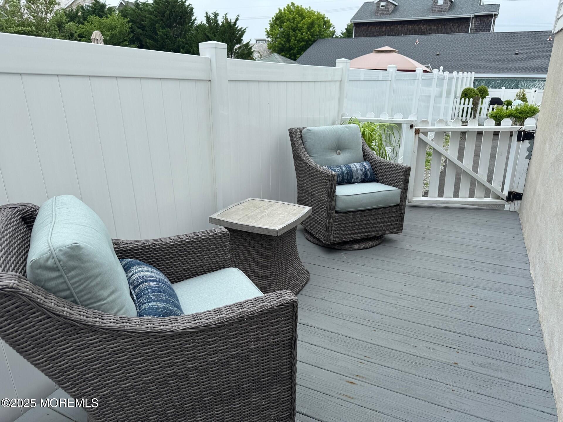 512 Main Avenue, Unit 4 Point Pleasant Beach, NJ 08742 - Photo 26 of 38 a balcony with furniture and a potted plant