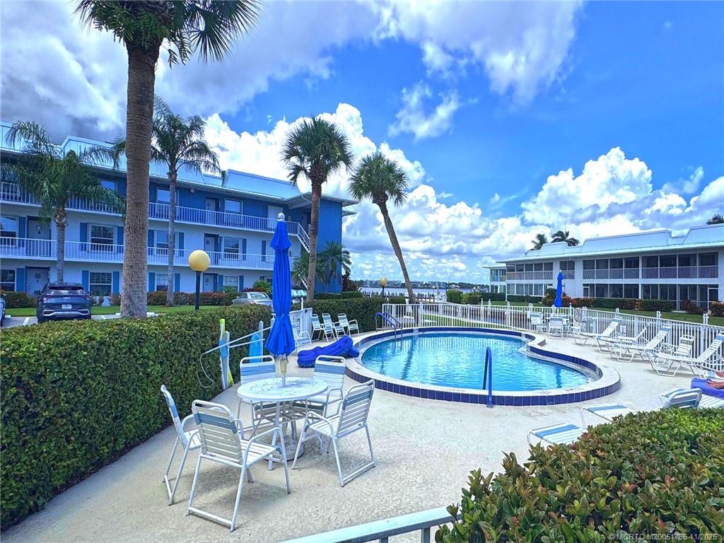 1866 Southwest Palm City Road, Unit 201 Stuart, FL 34994 - Photo 20 of 33 THE 3RD POOL IN THE WINDJAMMER IS RIGHT OUTSIDE YOUR DOOR