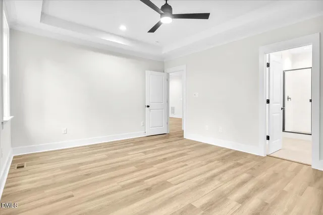 a view of empty room with windows