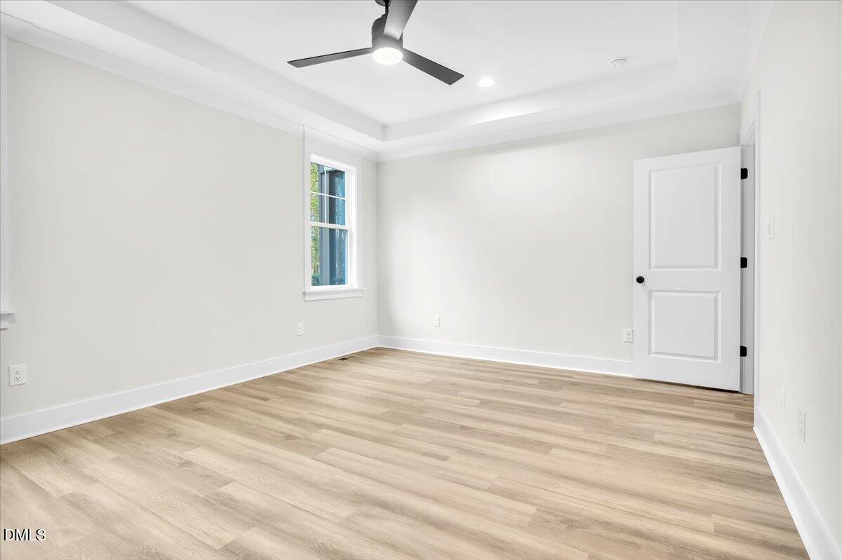 12916 Mallard Rock Road Zebulon, NC 27597 - Photo 20 of 68 wooden floor in an empty room