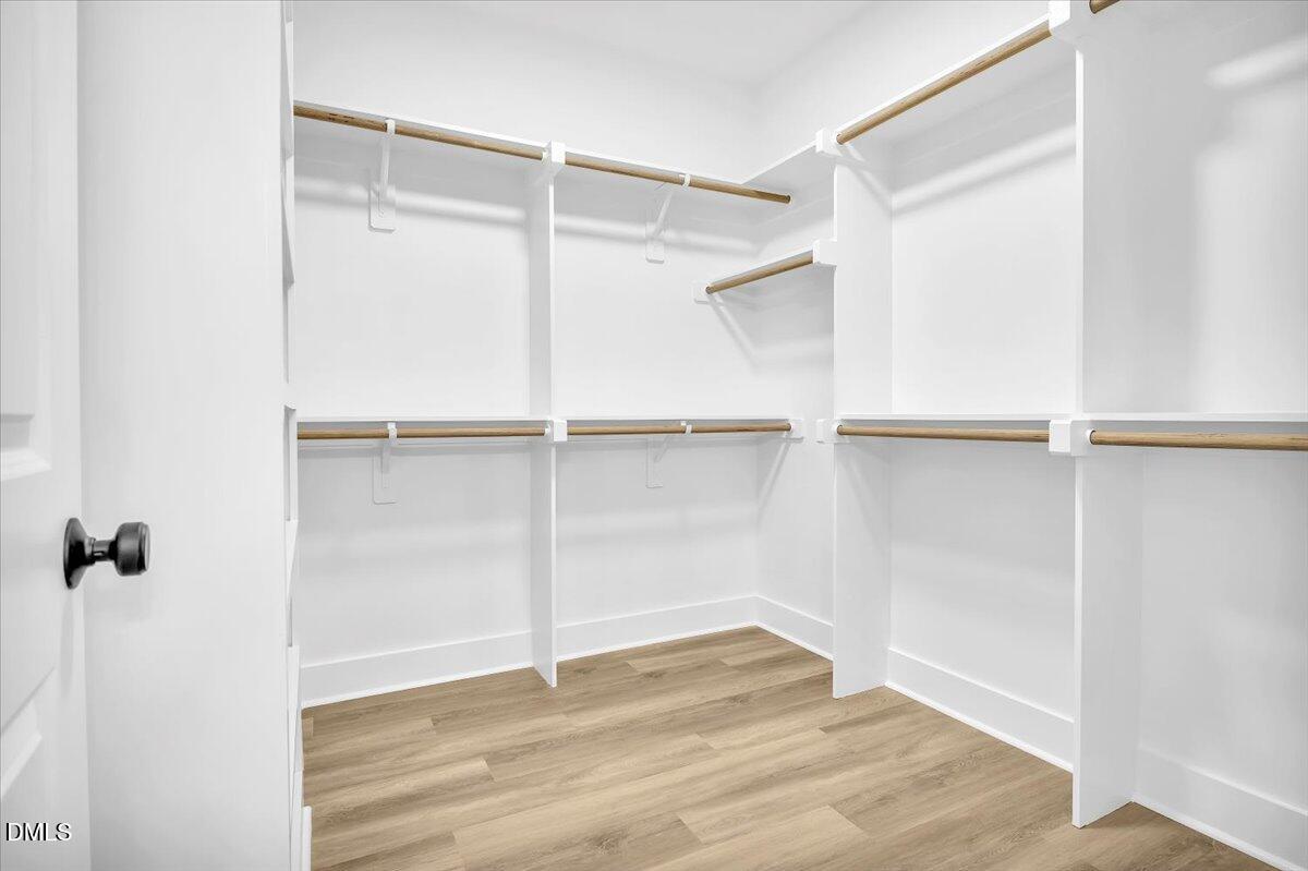 12916 Mallard Rock Road Zebulon, NC 27597 - Photo 25 of 68 a view of an empty walk in closet