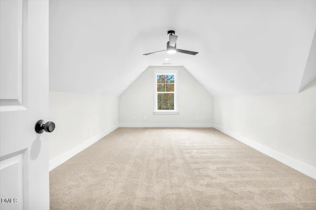 a view of a backyard of the house