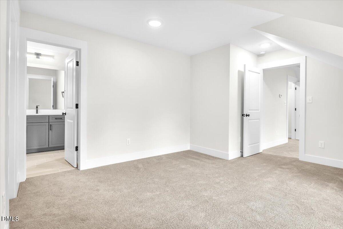 12916 Mallard Rock Road Zebulon, NC 27597 - Photo 35 of 68 a view of an empty room