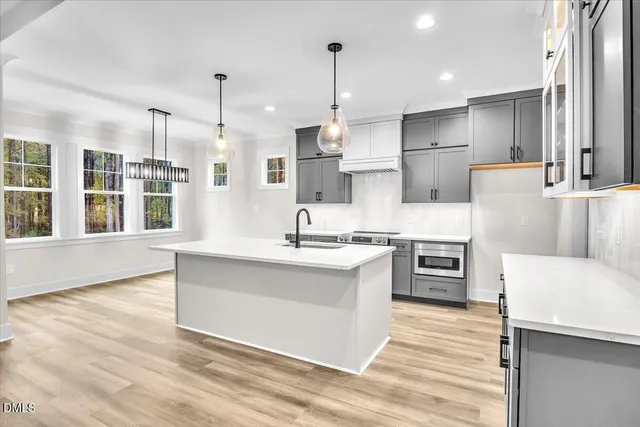 a view of cabinets and wooden floor