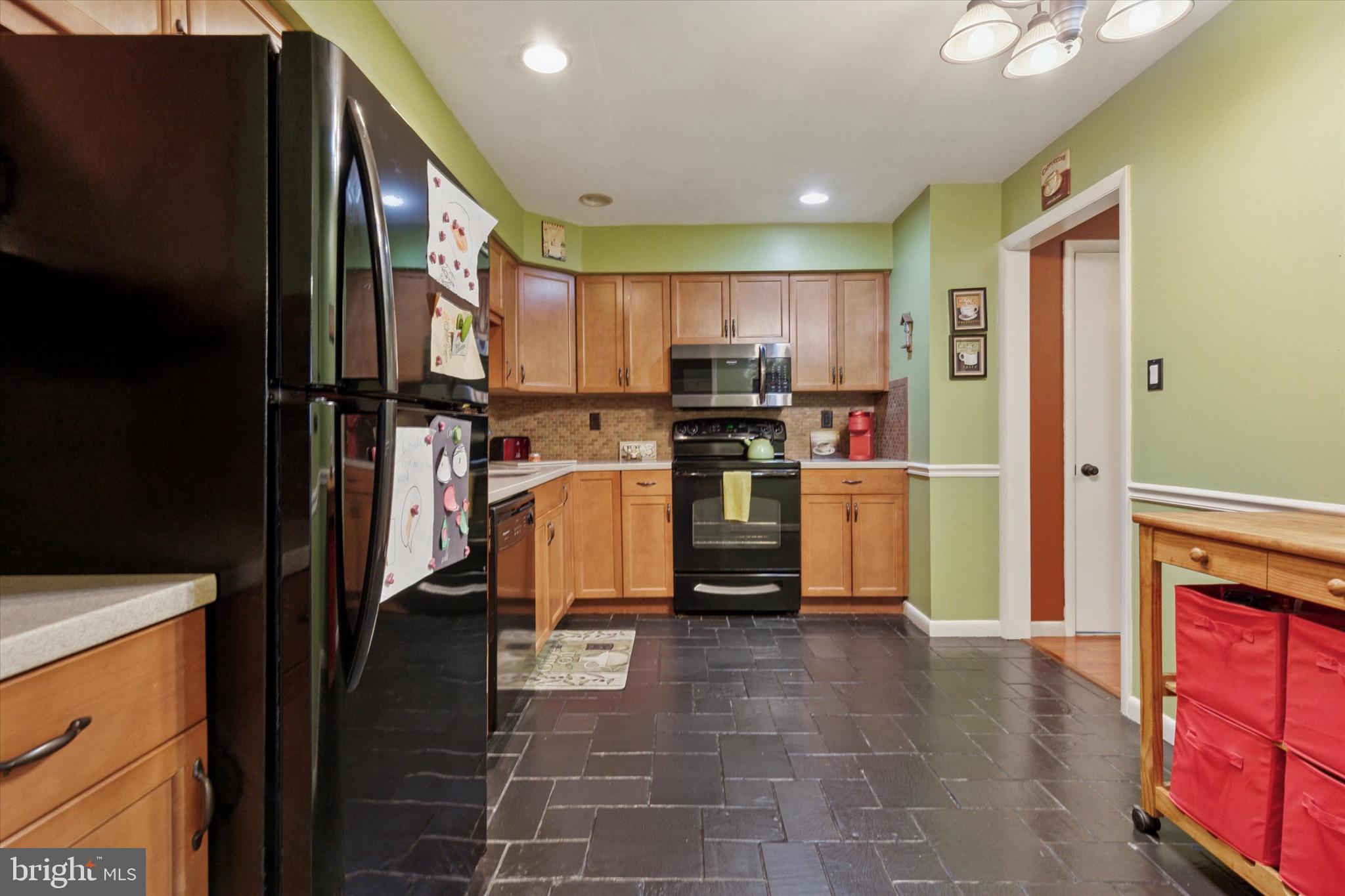 96 Providence Forge Road Royersford, PA 19468 - Photo 12 of 22 a kitchen with refrigerator and cabinets