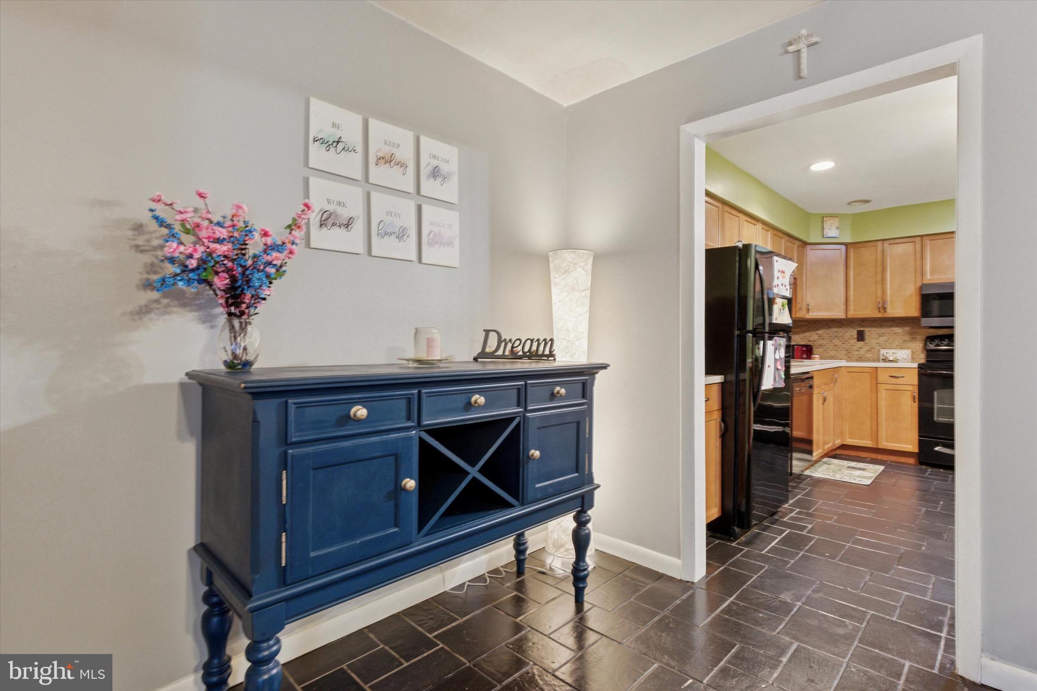 96 Providence Forge Road Royersford, PA 19468 - Photo 13 of 22 a view of kitchen with refrigerator microwave and cabinets