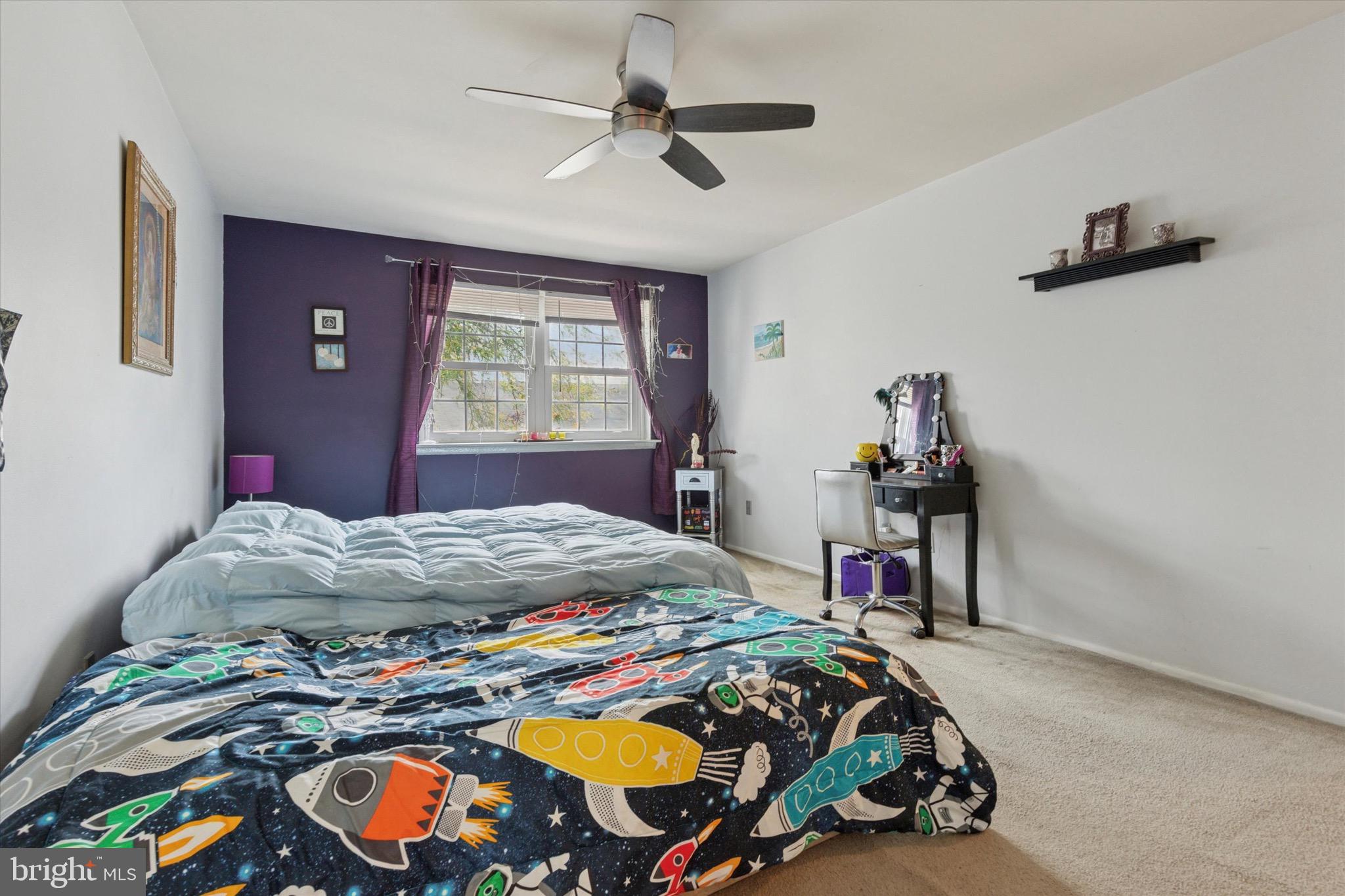 96 Providence Forge Road Royersford, PA 19468 - Photo 16 of 22 a bedroom with a bed and a chandelier