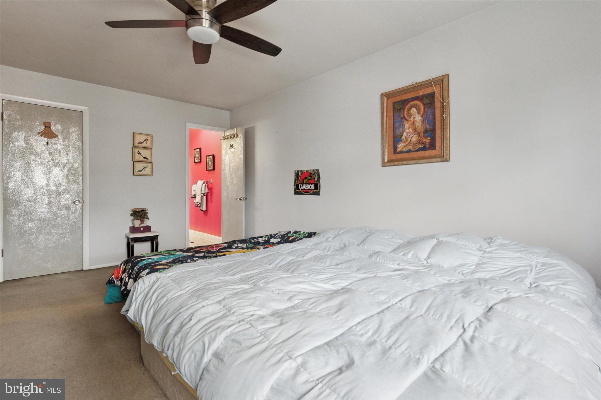 96 Providence Forge Road Royersford, PA 19468 - Photo 17 of 22 a bedroom with bed and paintings on the wall