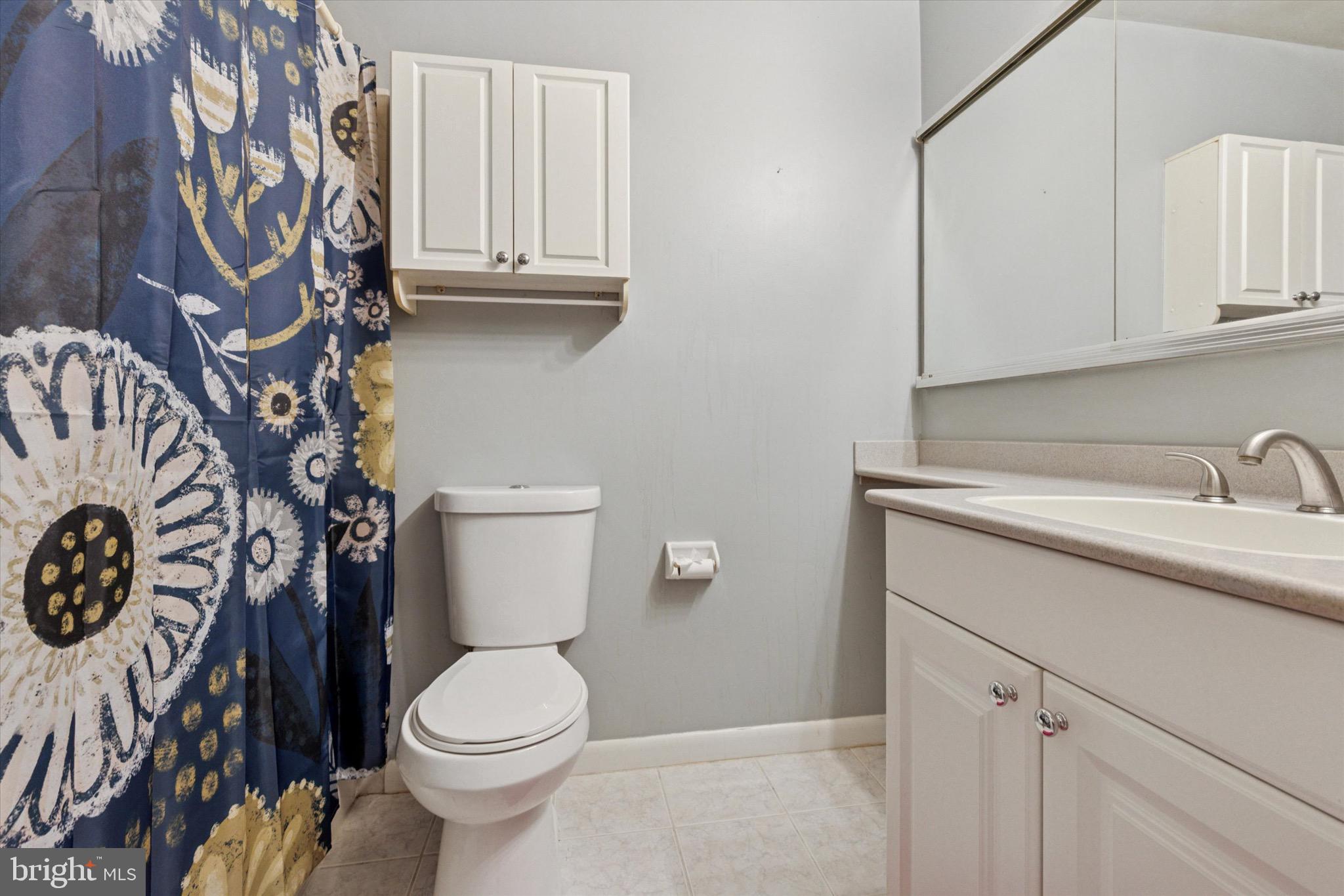 96 Providence Forge Road Royersford, PA 19468 - Photo 21 of 22 a bathroom with a toilet sink and mirror