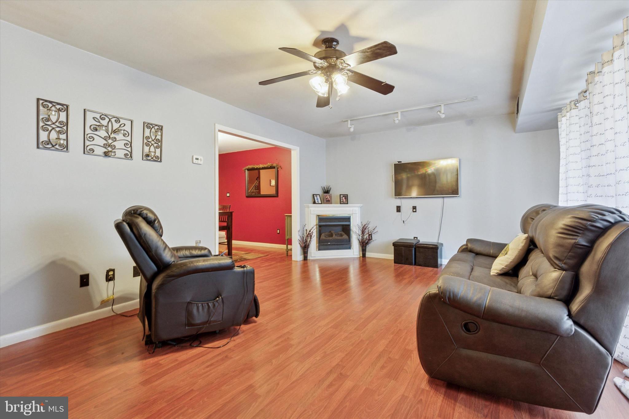 96 Providence Forge Road Royersford, PA 19468 - Photo 5 of 22 a living room with furniture and a flat screen tv