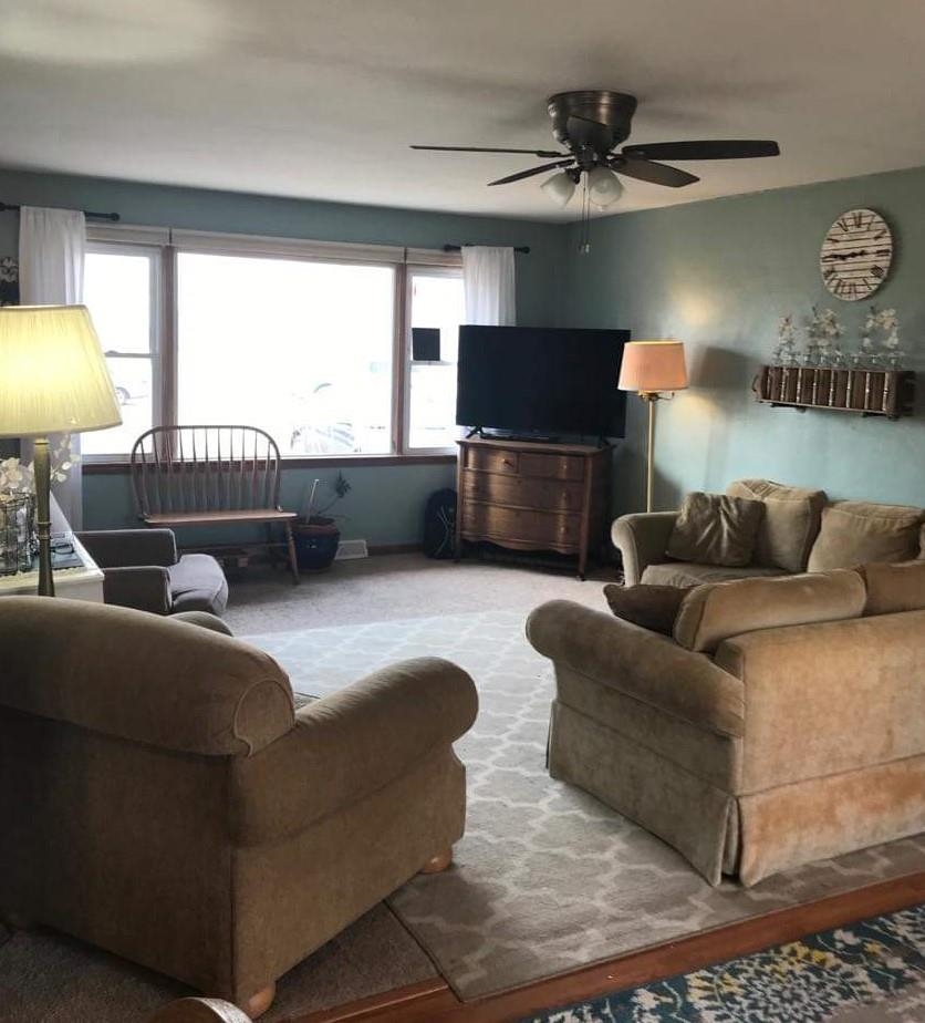 2256 East Maize Road Freeport, IL 61032 - Photo 3 of 22 a living room with furniture and a large window