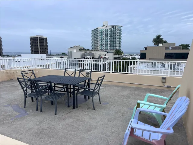 a view of dinning table and chairs in the patio