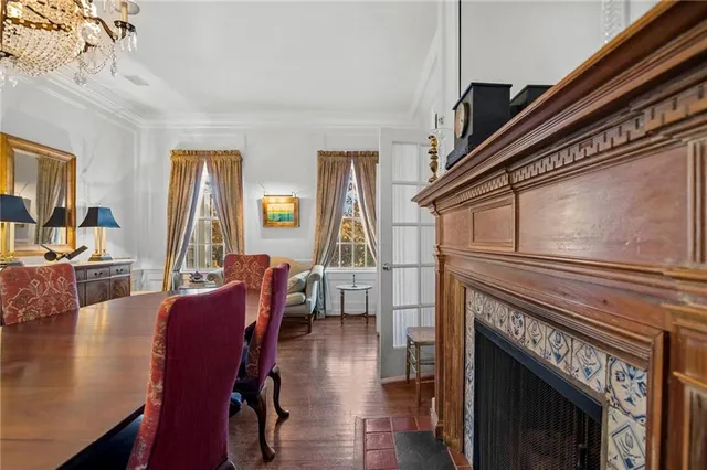 a view of a livingroom with furniture window and wooden floor