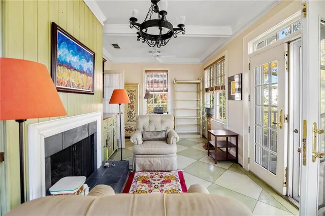 a view of a dining room with furniture and a window