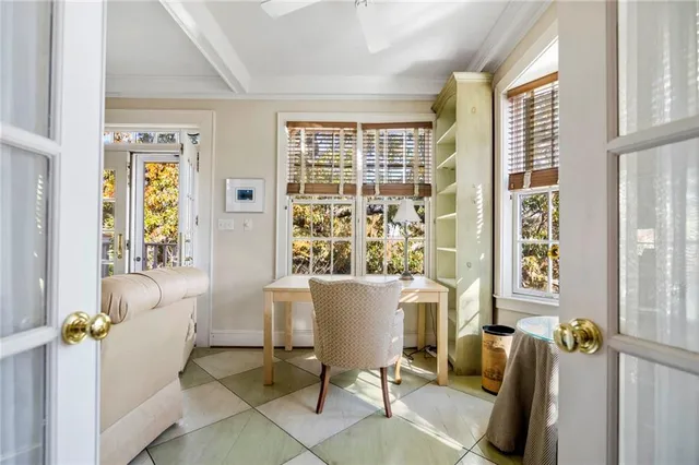a view of a livingroom with furniture and window