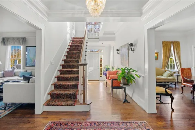 a view of entryway with wooden floor