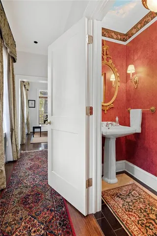 a view of a hallway with a dining area