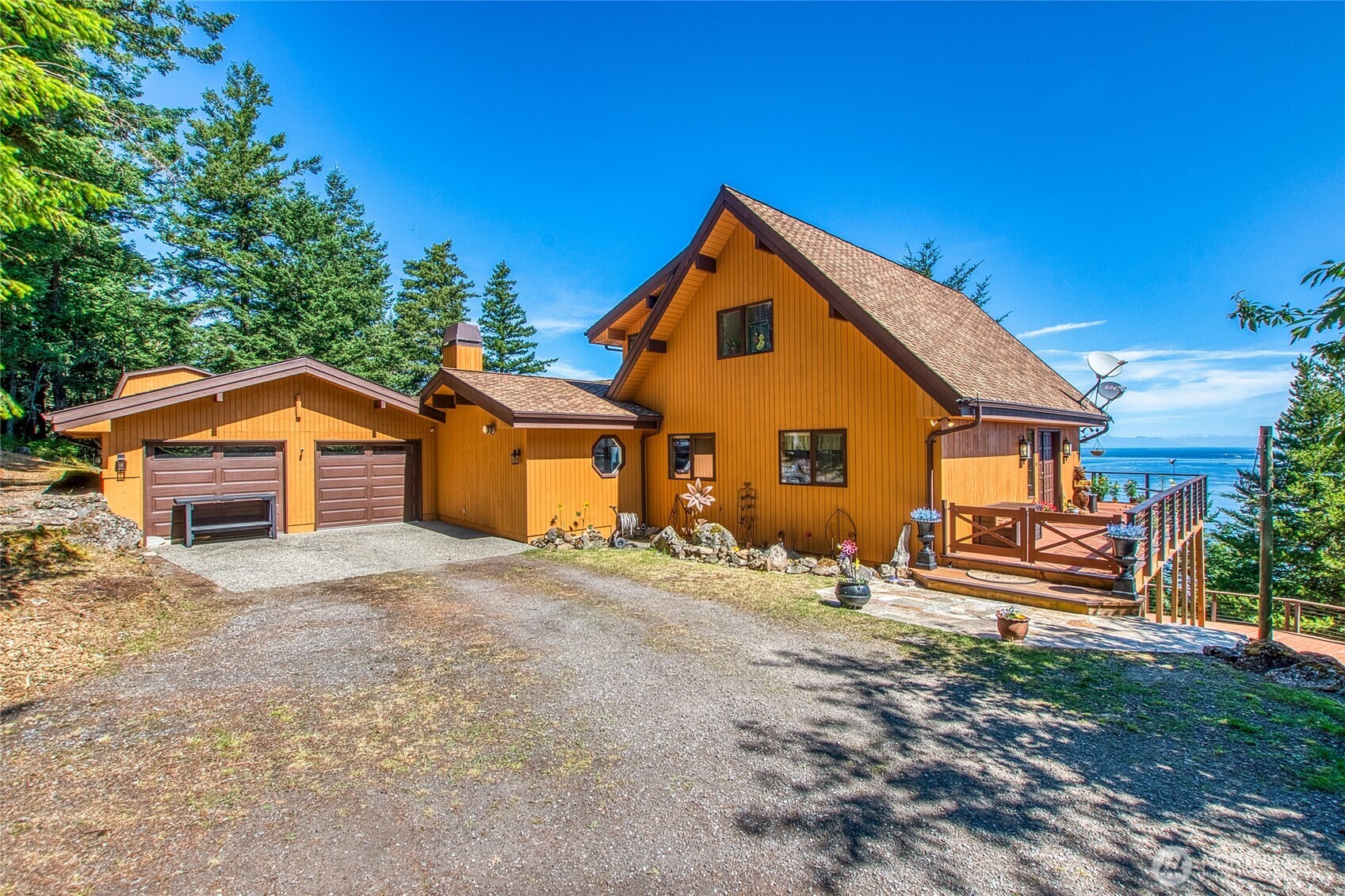 1669 Day Lake Road Orcas Island, WA 98245 - Photo 18 of 25 a front view of a house with a yard