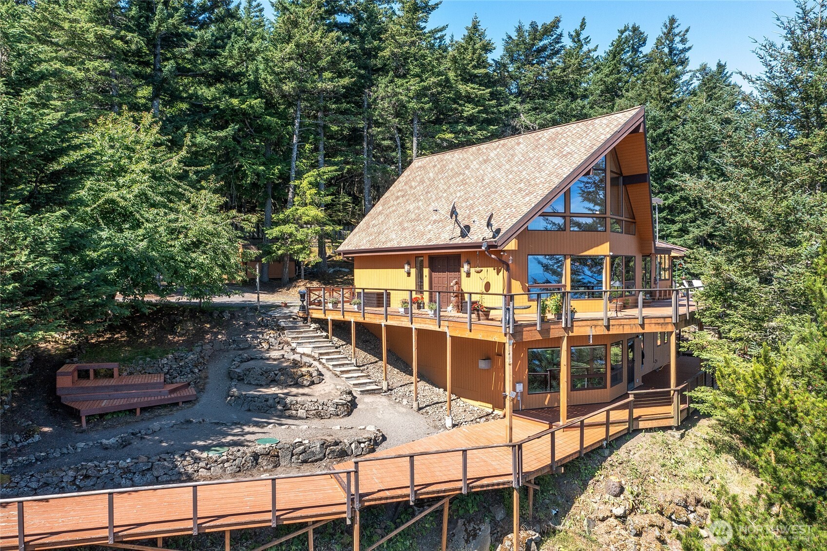 1669 Day Lake Road Orcas Island, WA 98245 - Photo 21 of 25 a view of a house with backyard and sitting area