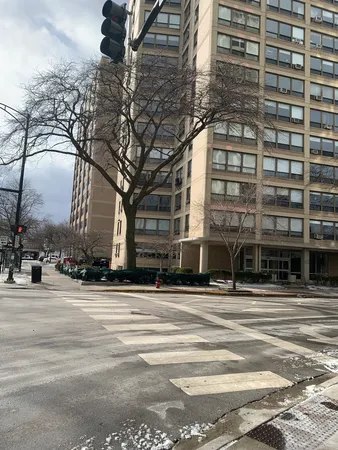a view of a building and a street