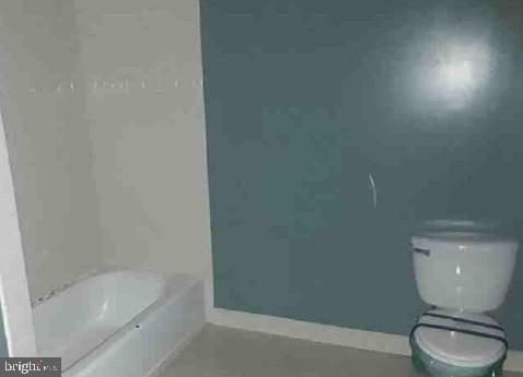 1303 Euclid Street Northwest Washington, DC 20009 - Photo 9 of 10 a bathroom with a toilet and a bathtub