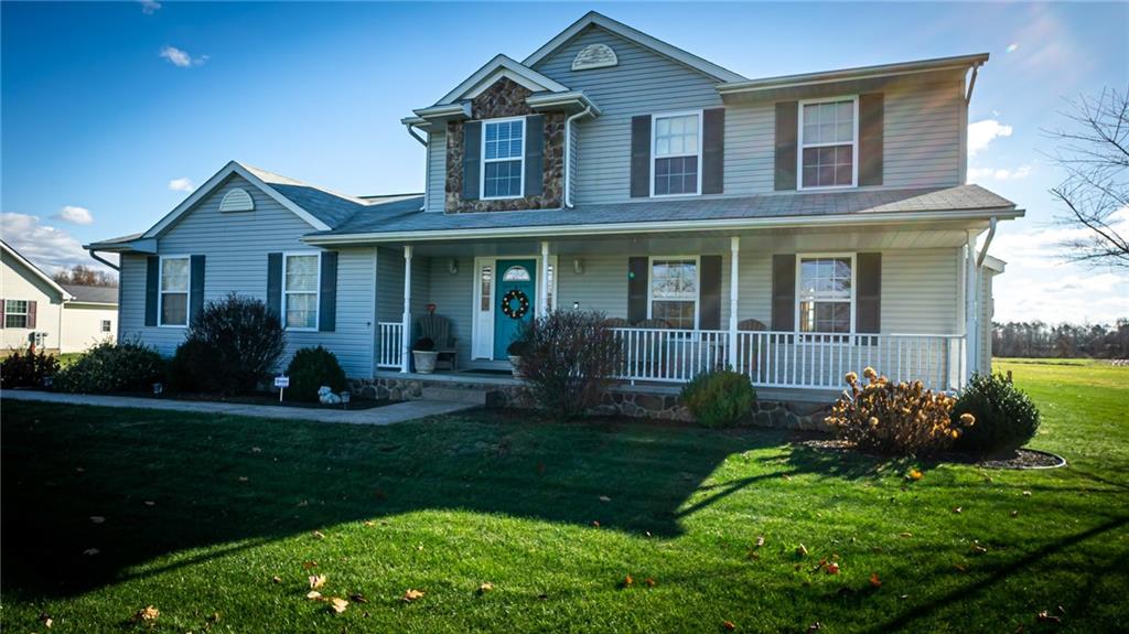 669 Unionville Road Butler, PA 16001 - Photo 1 of 21 a view of a house with a yard and plants