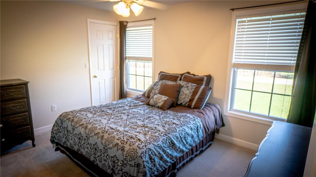 669 Unionville Road Butler, PA 16001 - Photo 16 of 21 a bedroom with a bed and a window
