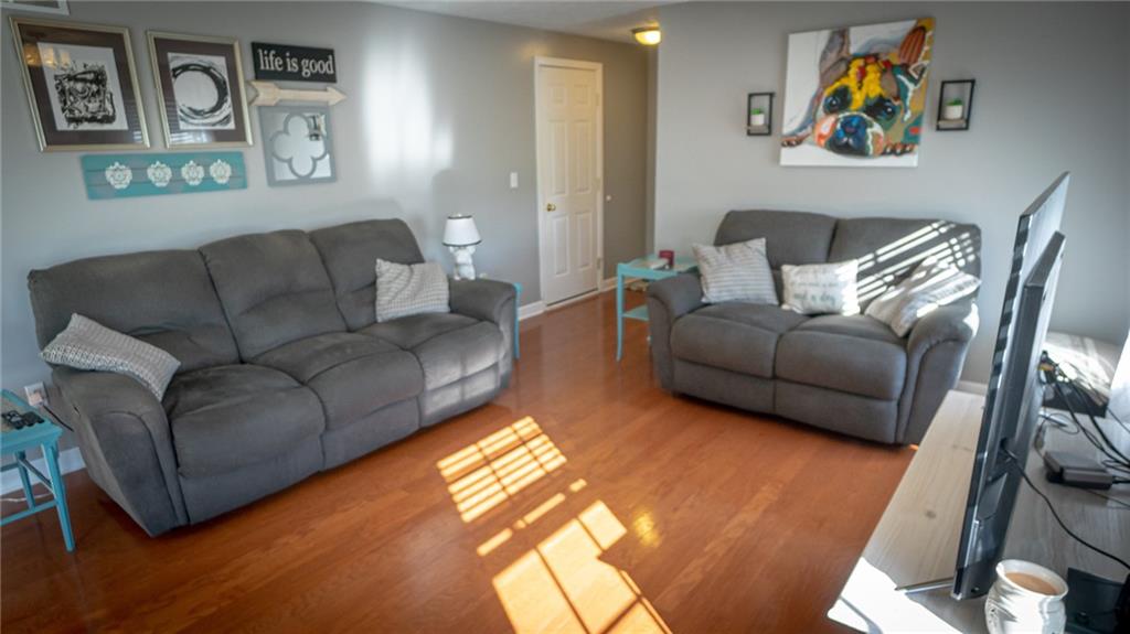 669 Unionville Road Butler, PA 16001 - Photo 3 of 21 a living room with furniture and a couch