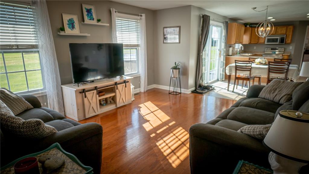 669 Unionville Road Butler, PA 16001 - Photo 4 of 21 a living room with furniture and a flat screen tv