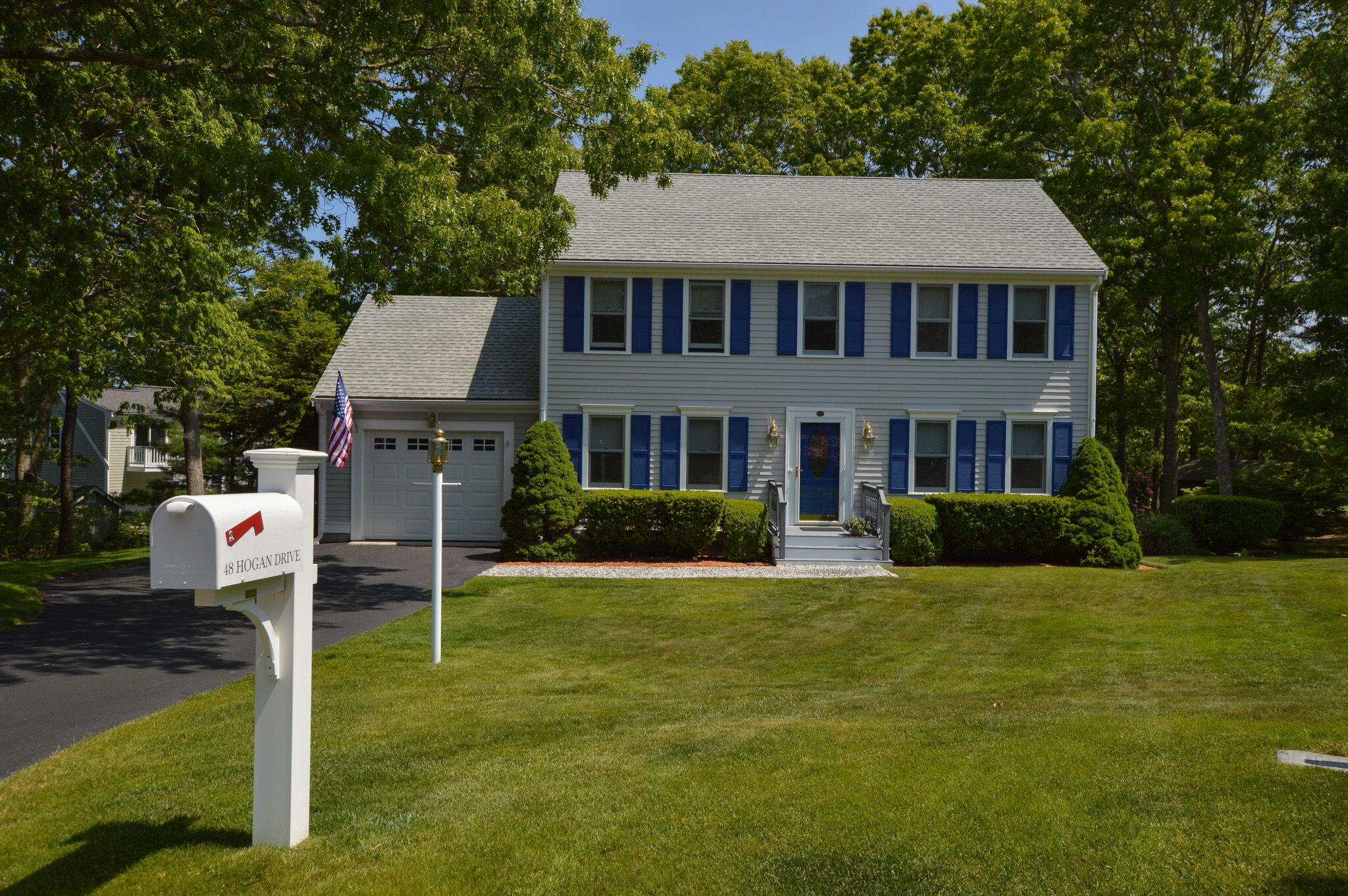 a aerial view of a house with a yard