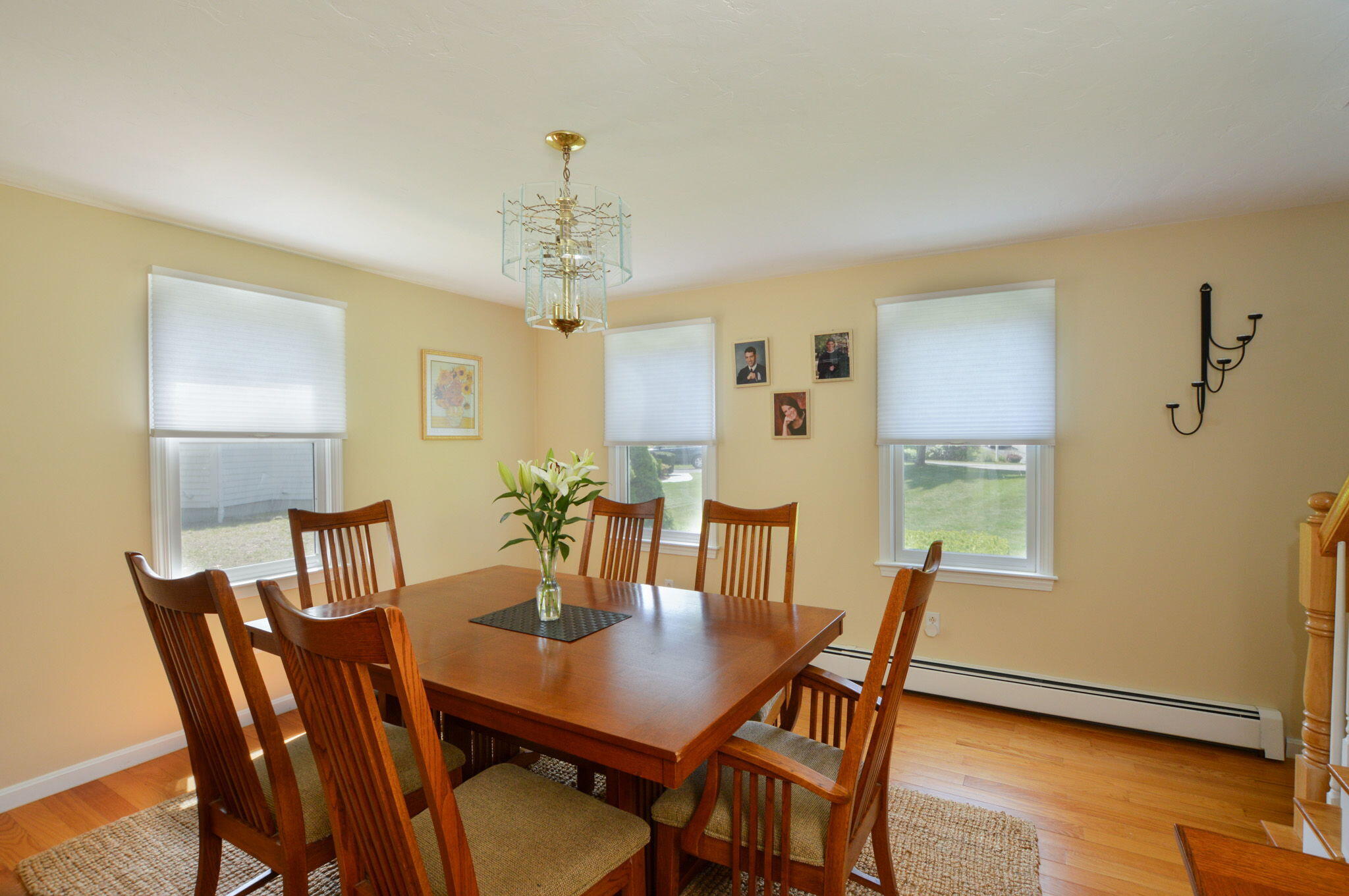 48 Hogan Drive Mashpee, MA 02649 - Photo 13 of 36 a view of a dining room with furniture and wooden floor
