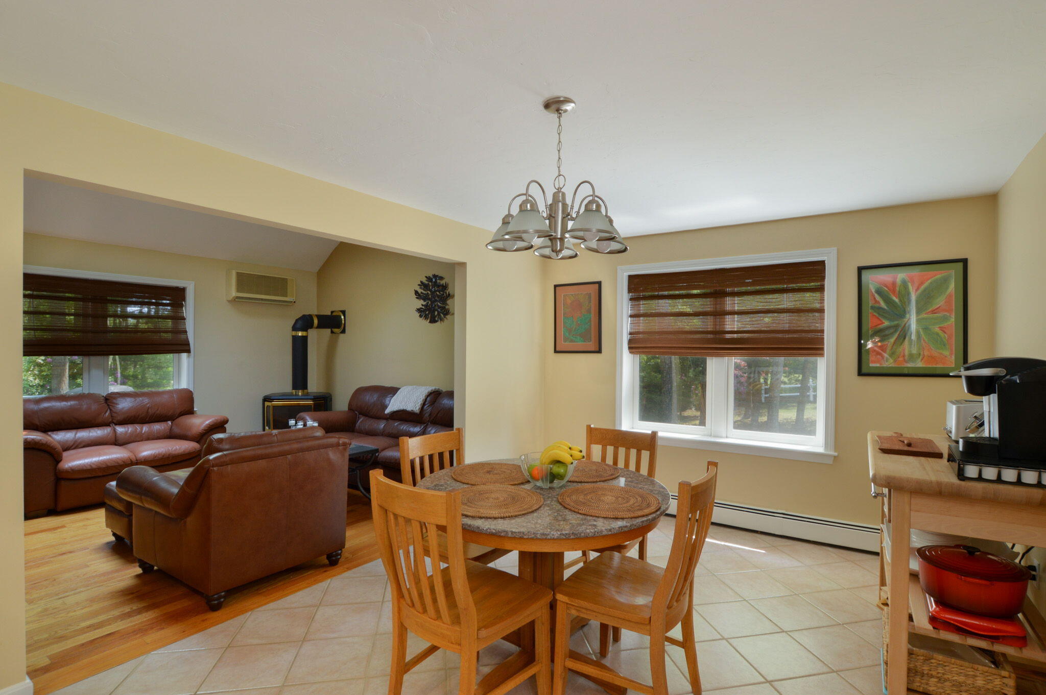 48 Hogan Drive Mashpee, MA 02649 - Photo 14 of 36 a view of a dining room with furniture and chandelier
